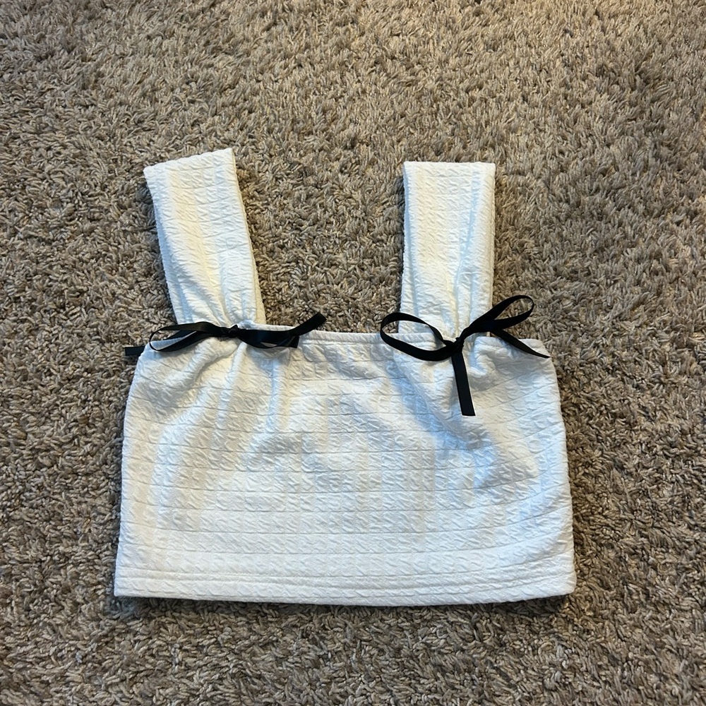 white tank top with black bows